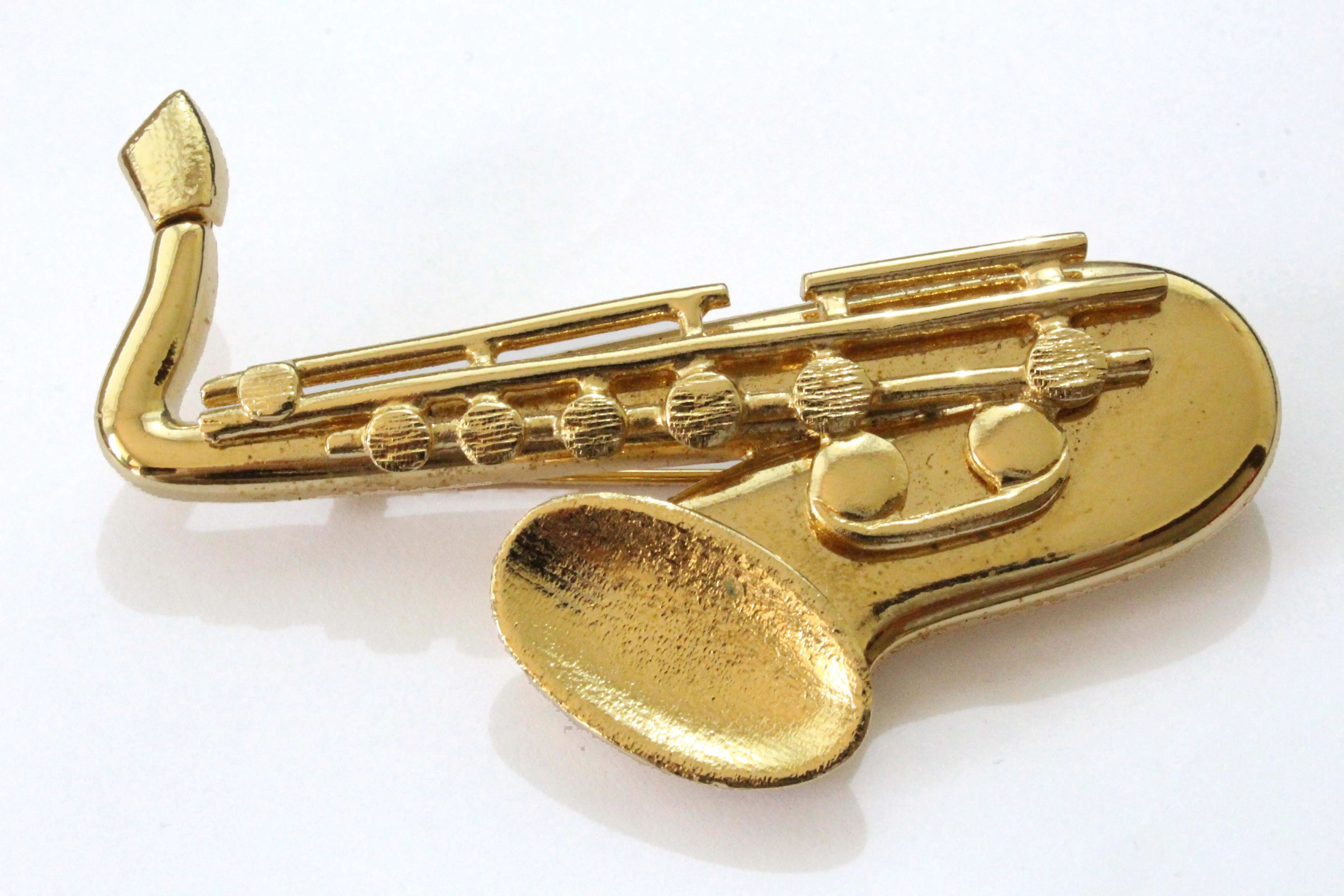 YVES SAINT LAURENT large saxophone brooch